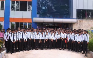 Hotel management students in uniform outside Dolphin School of Hotel Management, a low-fee hotel management college in Kolkata